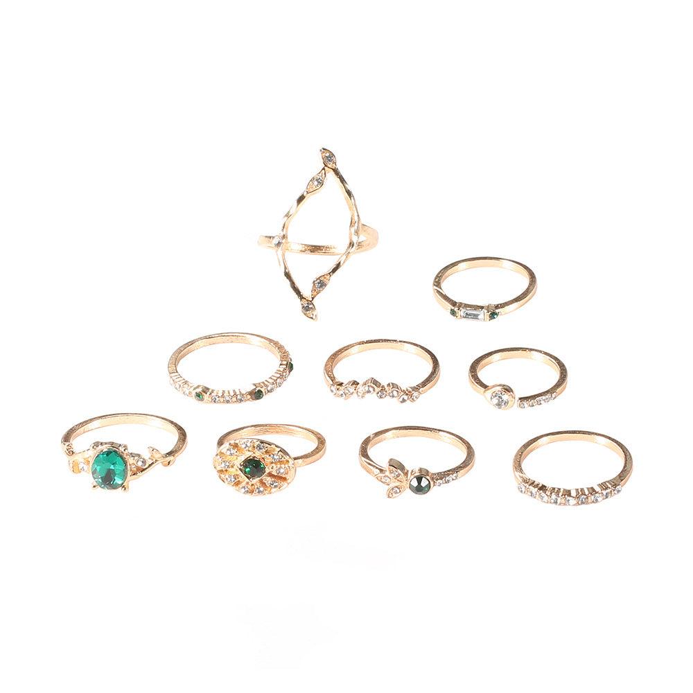 Ring with emeralds and diamonds - Cruish Home