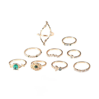 Ring with emeralds and diamonds - Cruish Home